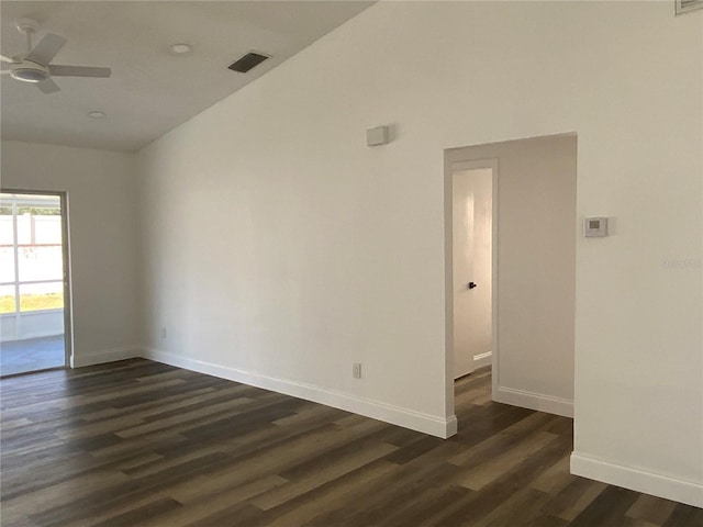 spare room featuring ceiling fan and dark hardwood / wood-style flooring