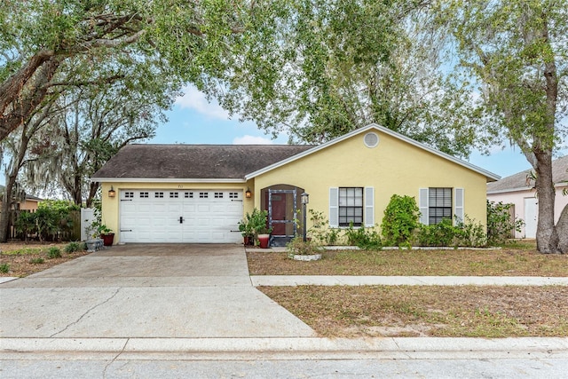 ranch-style home featuring a garage