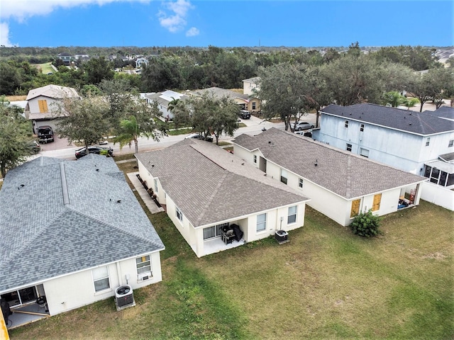 birds eye view of property with a residential view