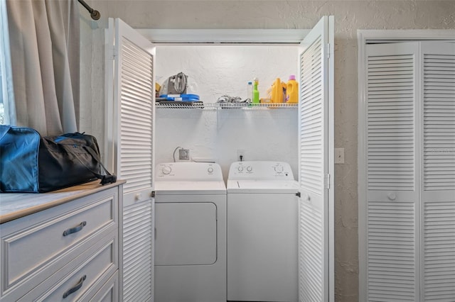 laundry room with washer and clothes dryer