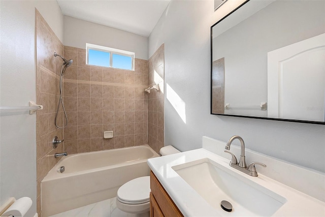 full bathroom with tiled shower / bath combo, toilet, and vanity