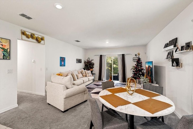 dining room featuring carpet