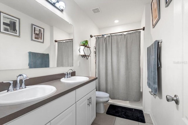 full bathroom with shower / bathtub combination with curtain, tile patterned flooring, vanity, and toilet