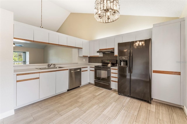 kitchen with black appliances, decorative light fixtures, white cabinetry, and sink