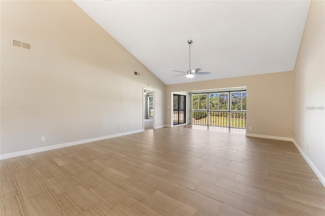 unfurnished living room with ceiling fan, high vaulted ceiling, and light hardwood / wood-style flooring