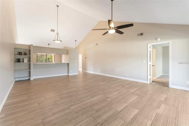 unfurnished living room with ceiling fan, light hardwood / wood-style floors, and high vaulted ceiling