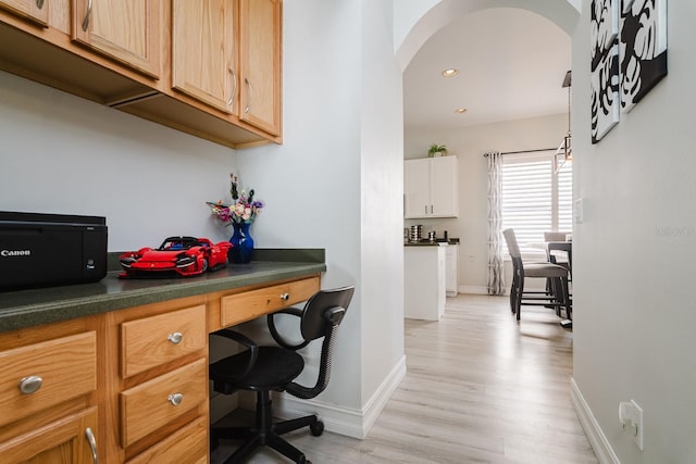 home office featuring light hardwood / wood-style flooring