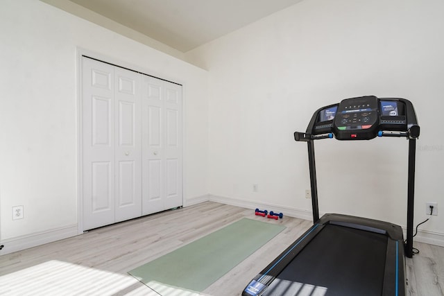 exercise area featuring light hardwood / wood-style flooring