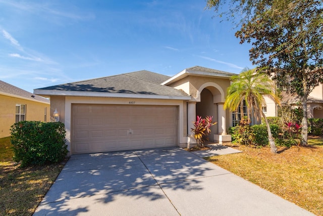 view of front of home with a garage