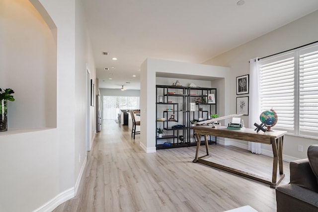 office space with light hardwood / wood-style floors