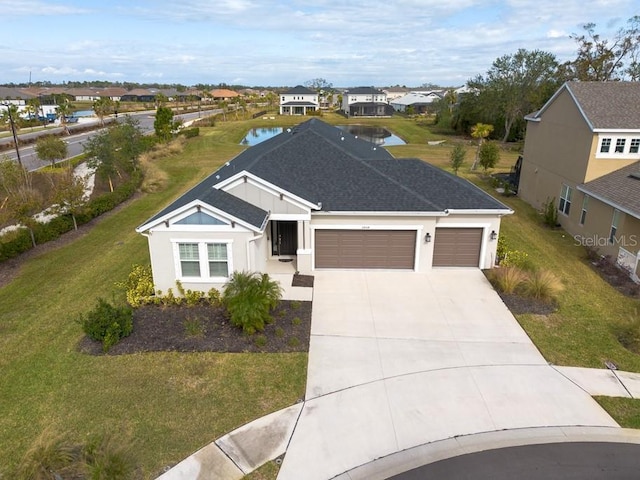 bird's eye view with a water view