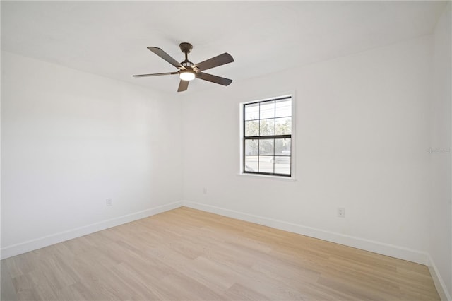 spare room featuring ceiling fan and light hardwood / wood-style floors