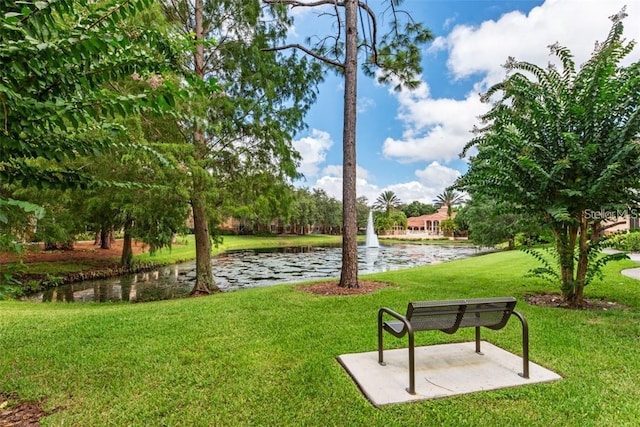 4166 Central Sarasota Pkwy Unit 521, Sarasota, FL 34238 - view of community with a water view and a lawn