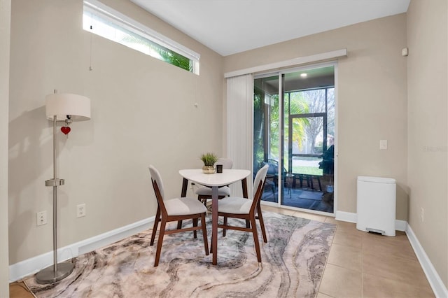 tiled dining area with plenty of natural light