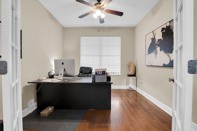 office space with ceiling fan and dark hardwood / wood-style flooring