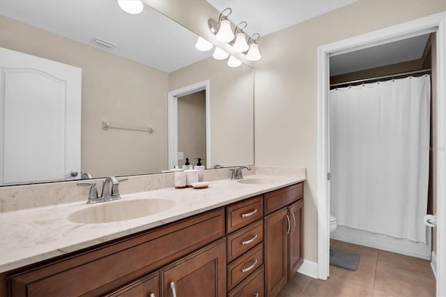 full bathroom featuring tile patterned flooring, shower / bath combination with curtain, vanity, and toilet