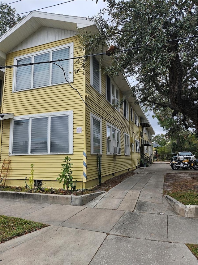 view of home's exterior featuring cooling unit