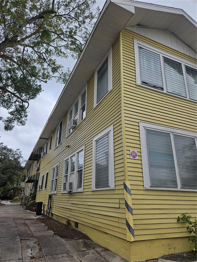 1909 W Dekle Ave, Tampa, FL 33606 - view of side of home featuring cooling unit