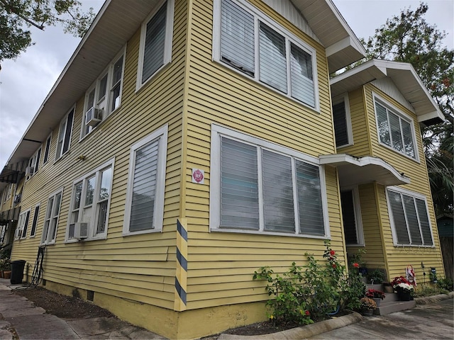 1909 W Dekle Ave, Tampa, FL 33606 - view of side of property featuring cooling unit