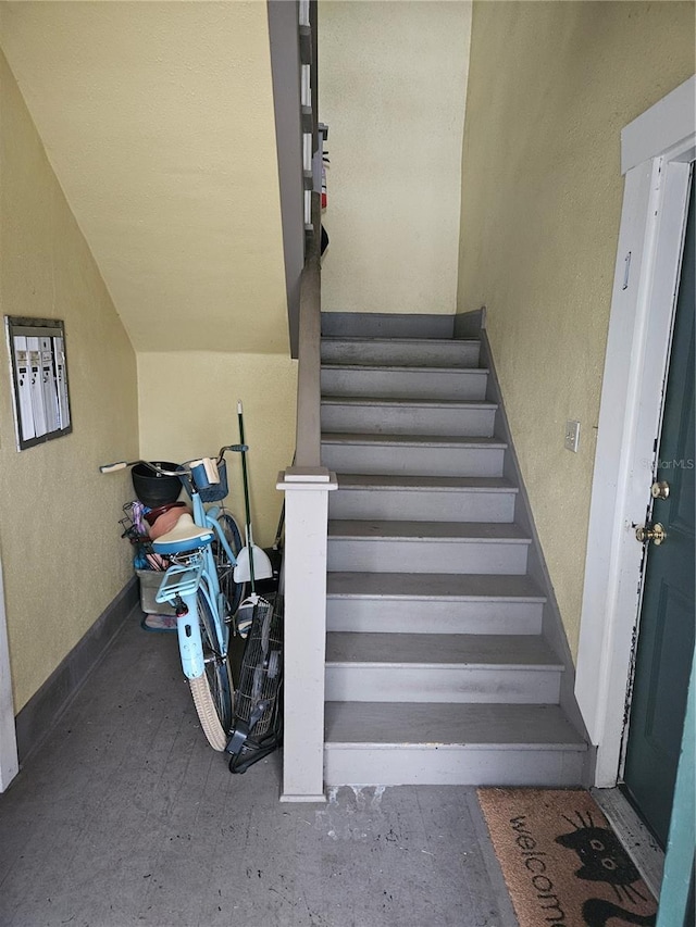 1909 W Dekle Ave, Tampa, FL 33606 - staircase featuring a textured wall