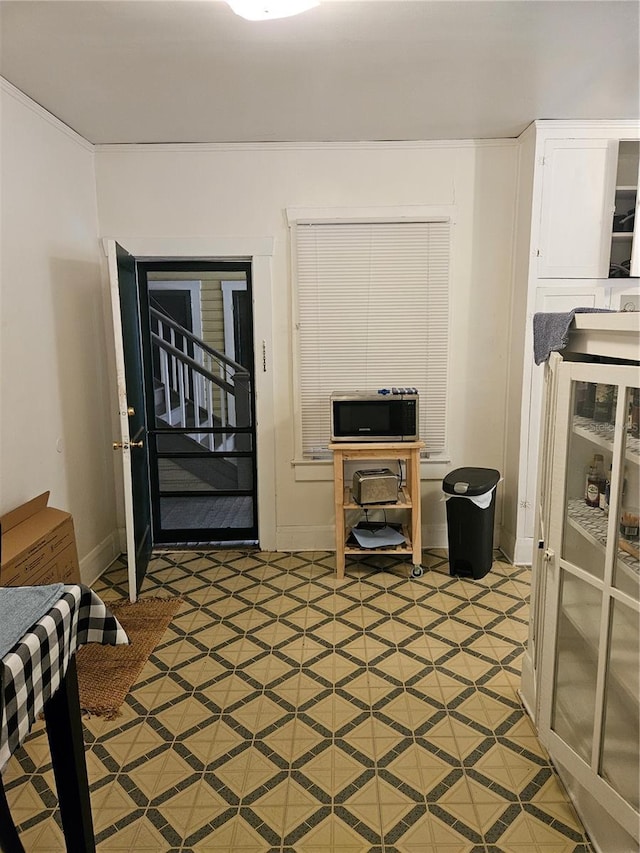 1909 W Dekle Ave, Tampa, FL 33606 - kitchen featuring baseboards and light flooring