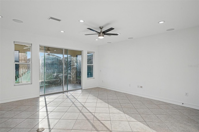 empty room featuring light tile patterned floors