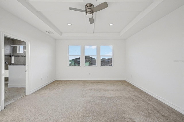 unfurnished room featuring light carpet and ceiling fan