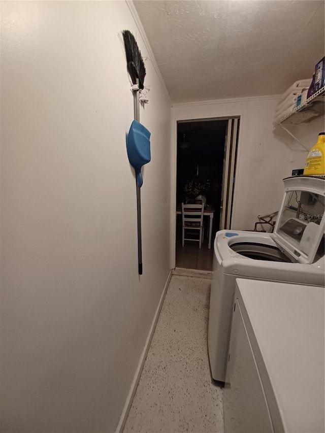 laundry room with washer and dryer