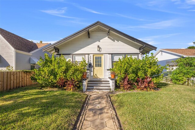 view of front of property with a front lawn