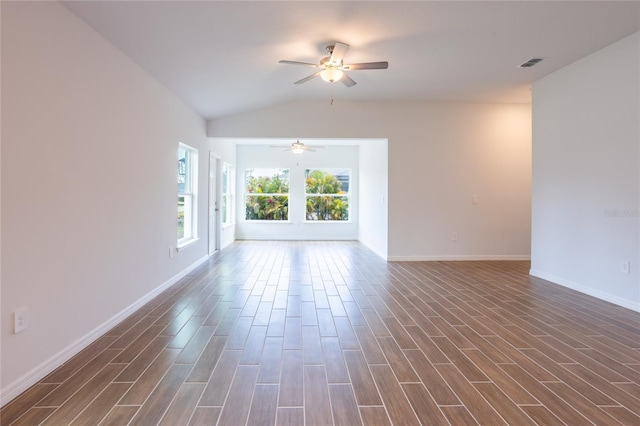 spare room with ceiling fan and vaulted ceiling