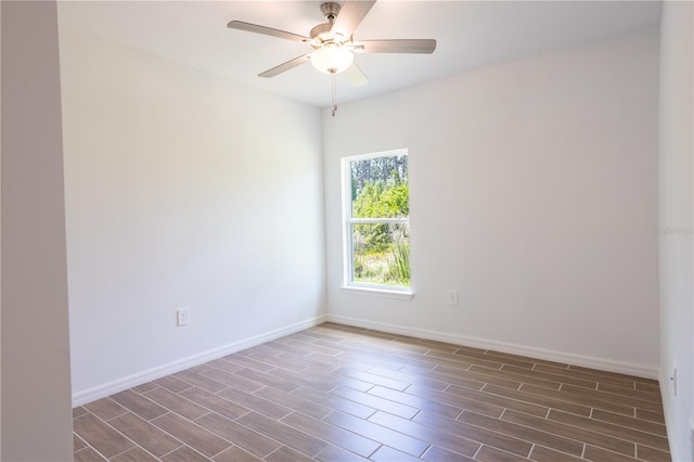 spare room with ceiling fan