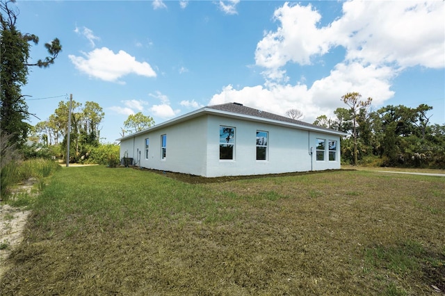 view of home's exterior featuring a yard