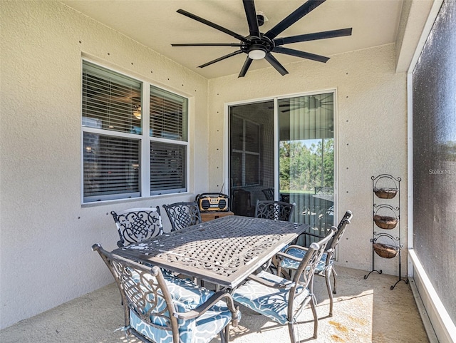 view of patio / terrace featuring ceiling fan