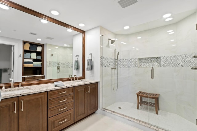 bathroom featuring vanity and walk in shower