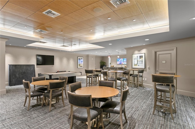 carpeted dining room featuring a tray ceiling and pool table