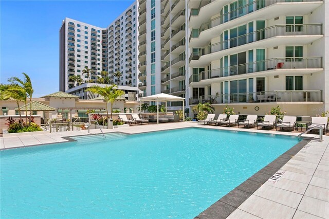 view of swimming pool with a patio area