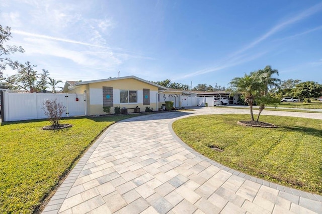 ranch-style house with a front yard