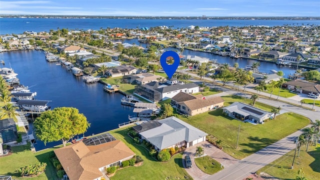 bird's eye view with a water view