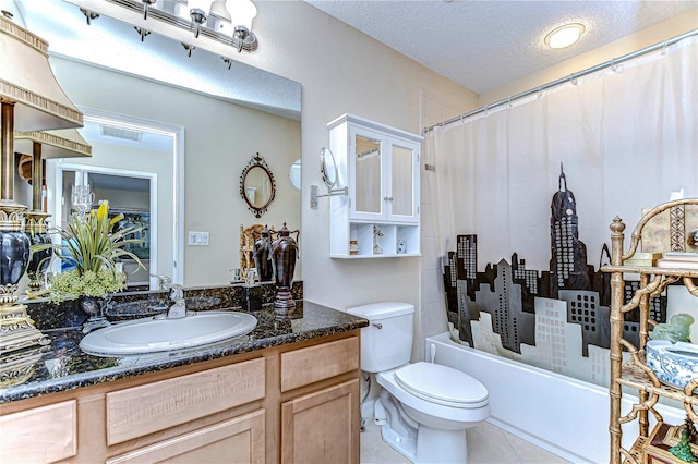 full bathroom featuring vanity, tile patterned floors, toilet, a textured ceiling, and shower / tub combo with curtain