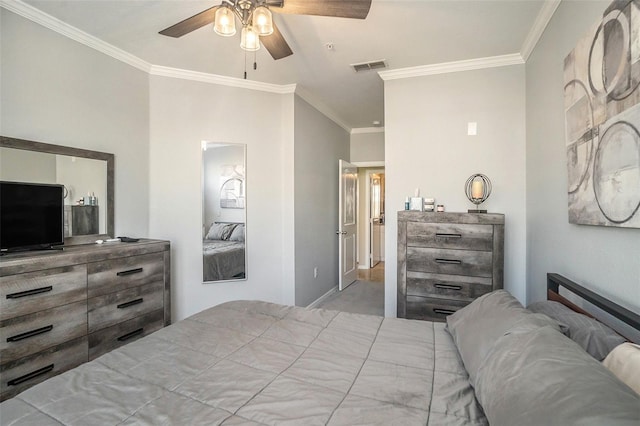 bedroom with ceiling fan and ornamental molding