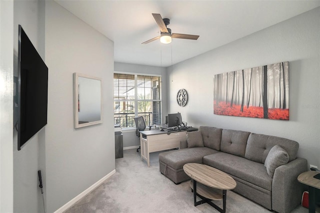 living room with light carpet and ceiling fan