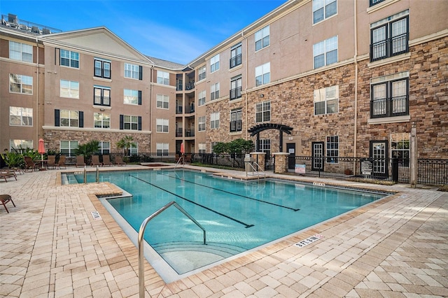 view of pool featuring a patio area