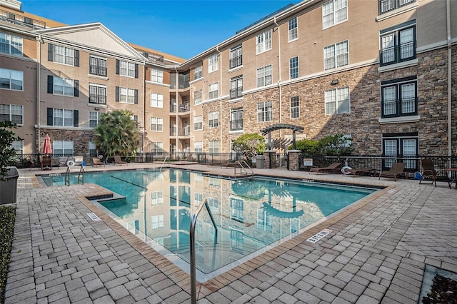 4221 W Spruce St Unit 2418, Tampa, FL 33607 - community pool with a patio