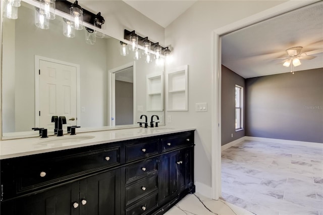 bathroom featuring ceiling fan and vanity