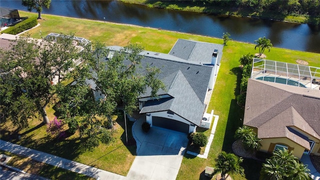 bird's eye view with a water view