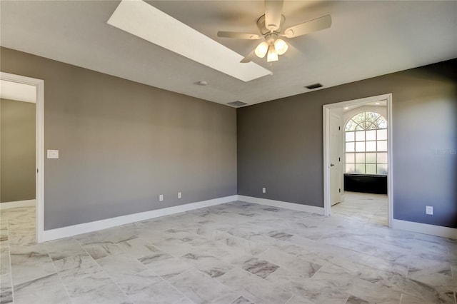 empty room featuring ceiling fan