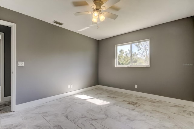 empty room featuring ceiling fan