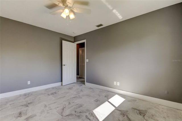 unfurnished room featuring ceiling fan