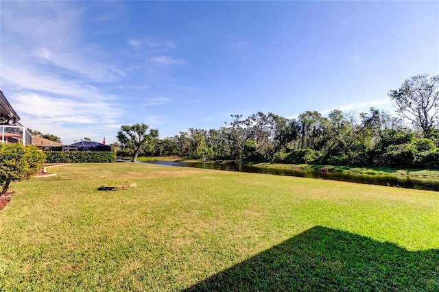 view of yard with a water view