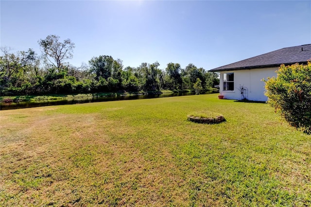 view of yard with a water view